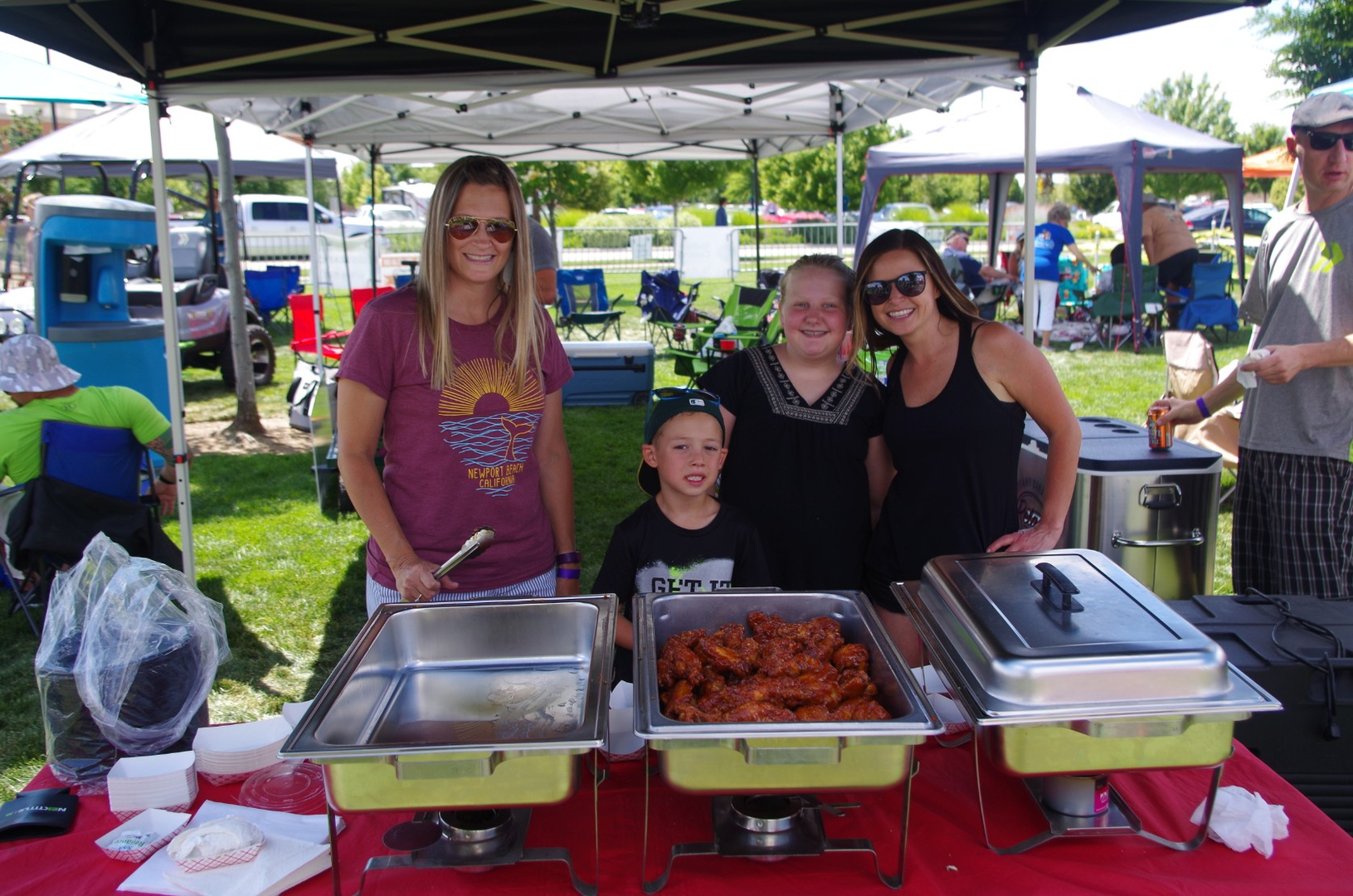 Family cooking chicken wings